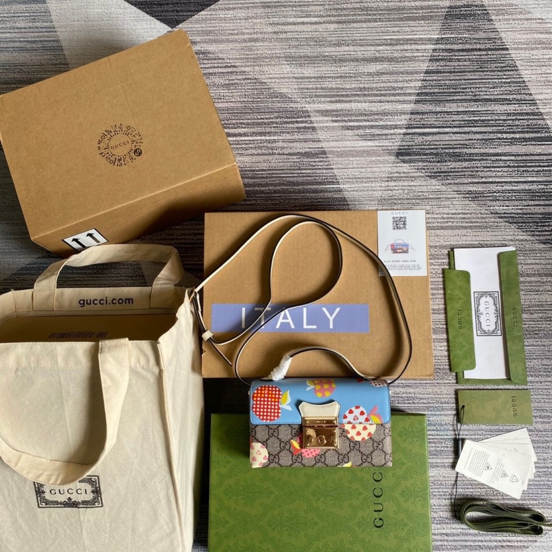 G*u*i top handle bags